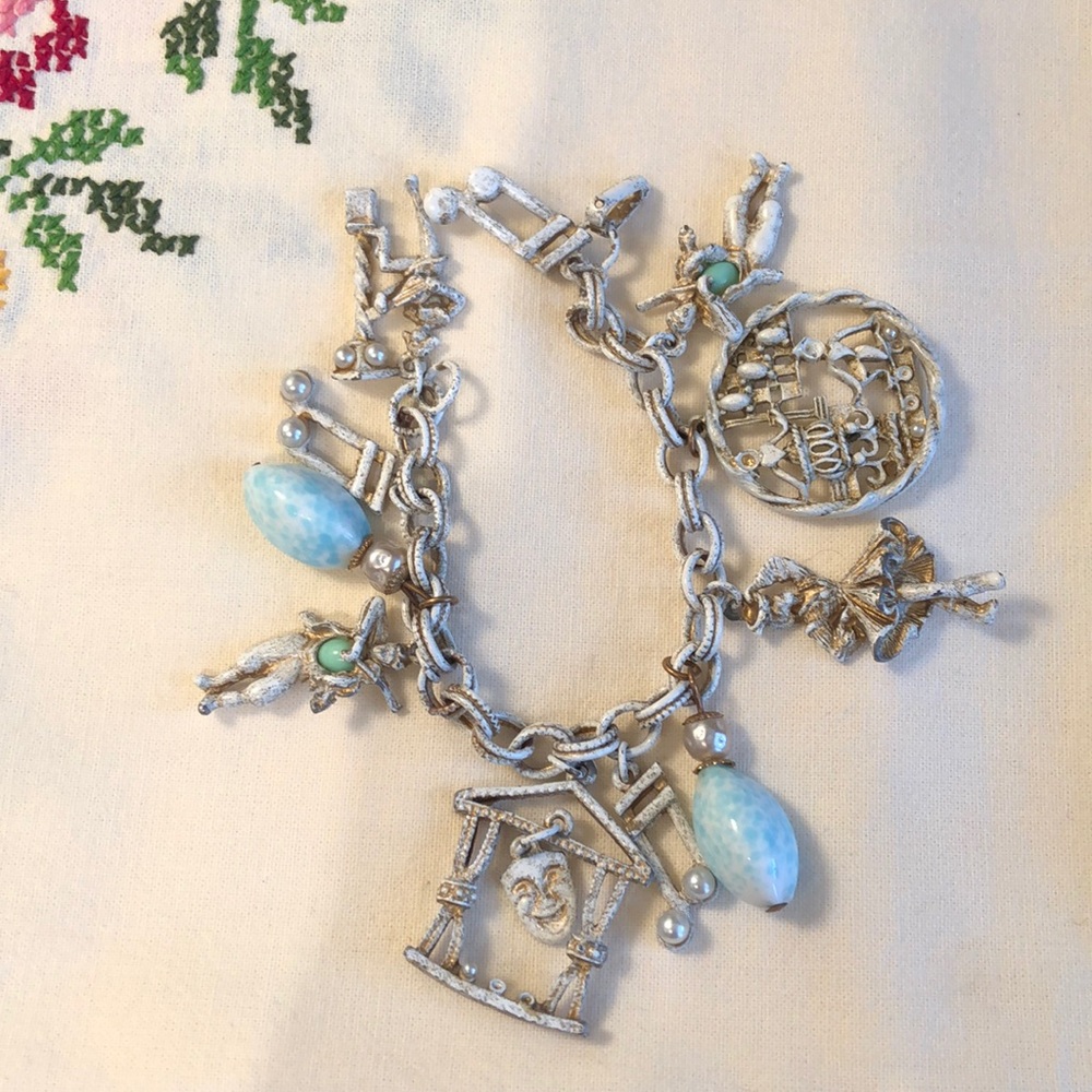 Vintage charm bracelet. Music and Drama theme.
